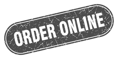 order online sign. order online grunge black stamp. Label