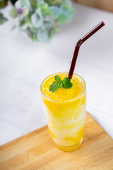 Mango, yogurt in a glass