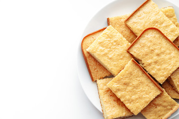 Semolina cake isolated on white background. Copy space