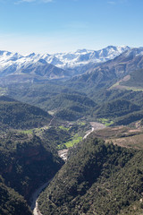 Fototapeta na wymiar mountainous area with river and snowy mountains