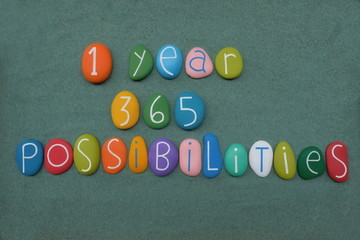 One year, 365 possibilities, Inspiration Motivational Quote composed with multi colored handmade...