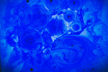 Abstract background from ink, milk and oil - vintage style
