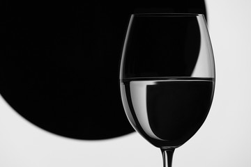 glass on black and white background