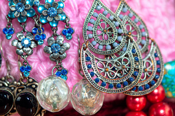 traditional earrings with decorative gemstones
