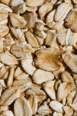 Close up. Dry, raw  oatmeal  ( oat flakes )  background. 