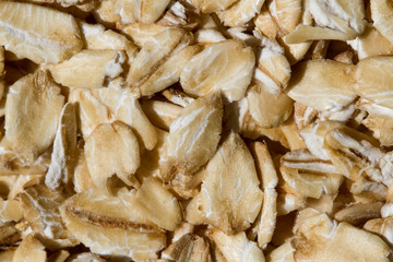 Close up. Dry, raw  oatmeal  ( oat flakes )  background. 