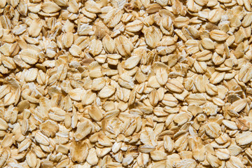 Close up. Dry, raw  oatmeal  ( oat flakes )  background. 
