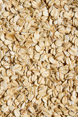 Close up. Dry, raw  oatmeal  ( oat flakes )  background. 