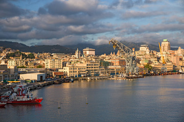 Panoramic view of Genoa and its port seen from the sea.