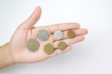 Hold Out One's Hand Hold Money Thai Coins Currency 10, 5, 2, 1 Baht and 50, 25 Satang on White Background                              