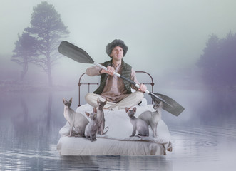 Middle aged man saving cats from flooding