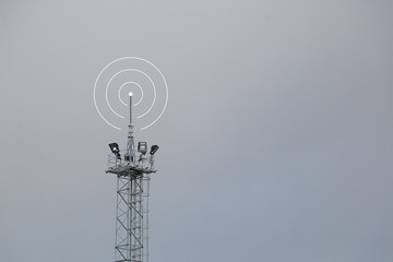 The post the transmission of cellular data on the sky background. Telecommunications tower for cellular communications.