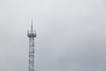The post the transmission of cellular data on the sky background. Telecommunications tower for...