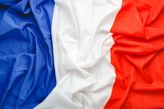 France flag background. French national flag as symbol of democracy, patriot. Closeup texture Flag France.Stock photo