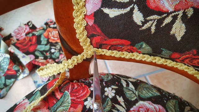 Close-up Of Scissors With Lacework On Chair