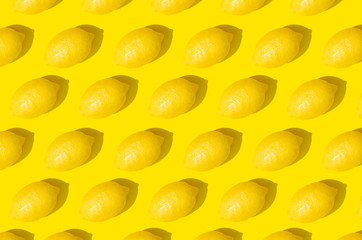 Monochrome pattern of lemon on a yellow background.