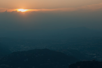 Como, Italy. Sunset over hills.