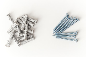 Dowels and fasteners screws isolated on white background