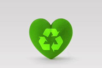 Green heart with recycling symbol on white background - Concept of ecology