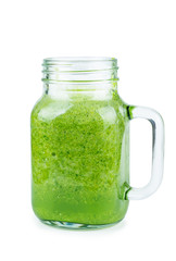 Glass of homemade spinach and broccoli smoothie