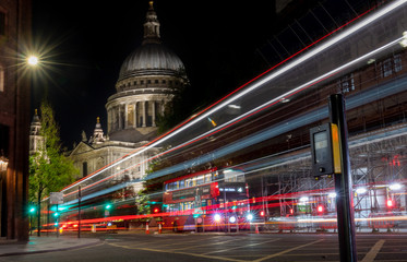 St Paul's cathedral at night with passing traffic blurred