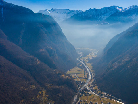 aerial view on Maggia valley in Ticino with snowcapped mountains