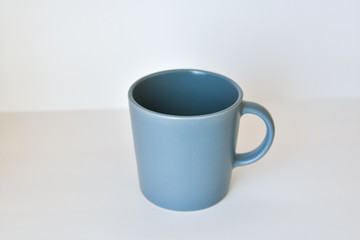 coffee tea cup on a white table in a bright kitchen