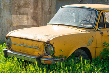 old rusty yellow car