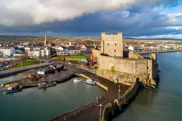 Fototapeta premium Carrickfergus, Northern Ireland. Castle, harbor and town