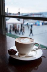 Coffee and snacks, drinking while watching through the window