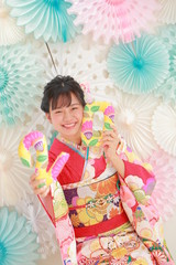 Attractive girl wearing traditional japanese kimono in kyoto, Japan.