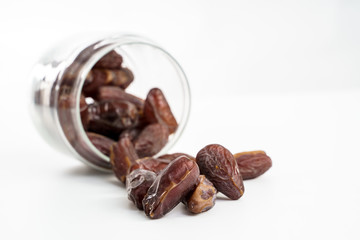 Dates fruit on white background. Medjool dried date palm fruits