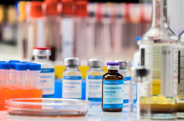 Coronavirus covid-19 experimental vaccine in a laboratory, conceptual image