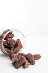 Dates fruit on white background. Medjool dried date palm fruits
