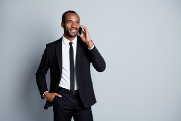 Portrait of his he nice attractive elegant imposing classy cheerful guy recruiter talking on cell...