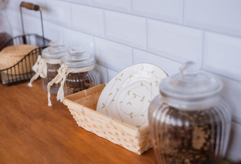 kitchen utensils on a shelf, plate, sorting