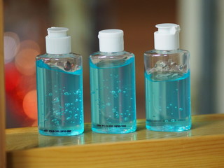 Hand Sanitizer, gel alcoholic mixture with gelatin in clear Plastic bottle with pump pushing wash clean dirty to prevent germs protect Contagious disease corona virus, covid-19