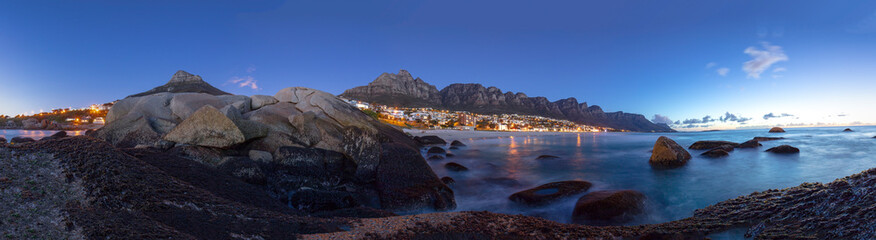 panoramic view of Camps Bay and Table Mountain at sunset