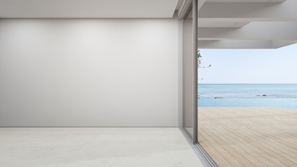 Fototapeta premium Blank wall on empty beige marble floor of large living room in modern house or luxury pool villa. Minimal home interior 3d rendering with beach and sea view.