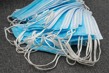 Pile of surgical face masks to protect against virus infections
