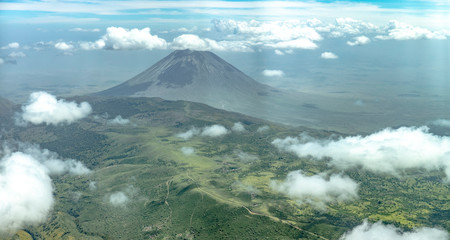 Aerial view of a volcano, Mount Ol Doinyo Lengai in East African landscape 