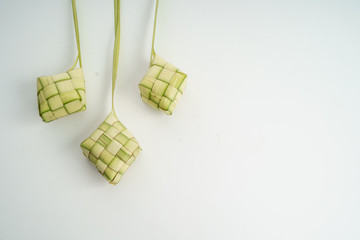 Ketupat over white. rice cake for idul fitri tradition