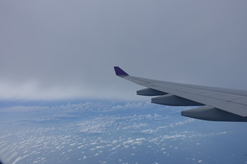 Fototapeta premium an airplane on the blue sky