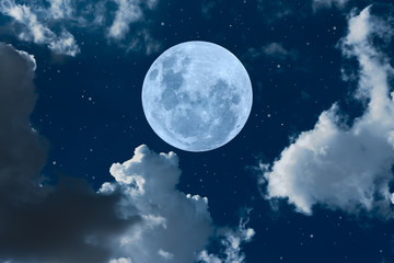 Naklejka na ściany i meble Full moon and clouds on the sky.