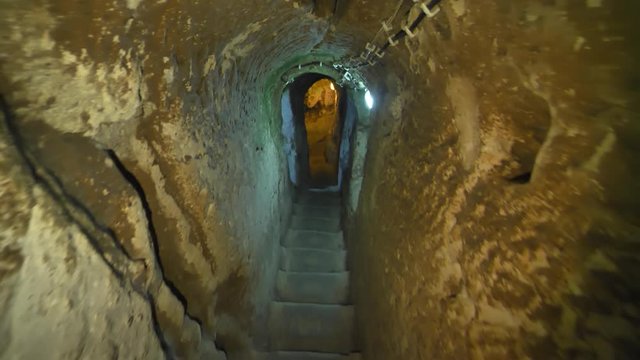 Staircase in the cave. Ancient Christian caves in Cappadocia. Turkey.