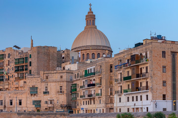 Fototapeta na wymiar Valletta. The Basilica of Our Lady and the Tower of the Cathedral.