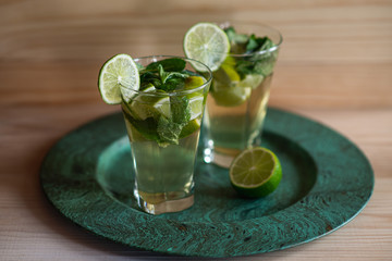 mojito cocktail on wooden table