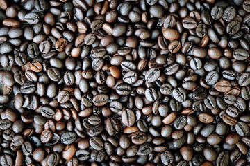 Obraz premium Roasted coffee beans background.