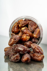 Dates fruit on white background. Medjool dried date palm fruits
