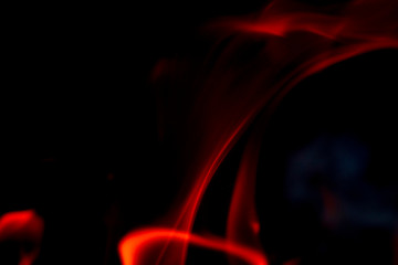 Beautiful fire flame on a black background. Blurry abstraction